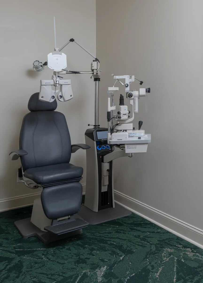 Exam lane with exam chair and slit lamp at Classic Vision Care East Cobb