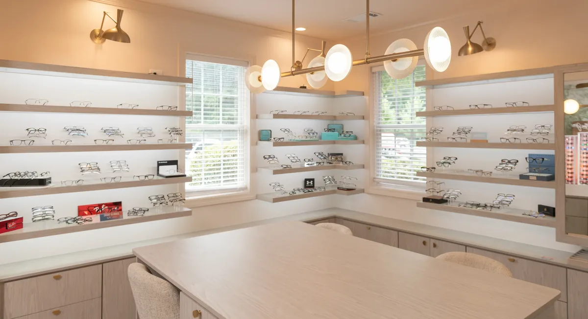 Optical showroom with frame shelves and styling table at Classic Vision Care East Cobb